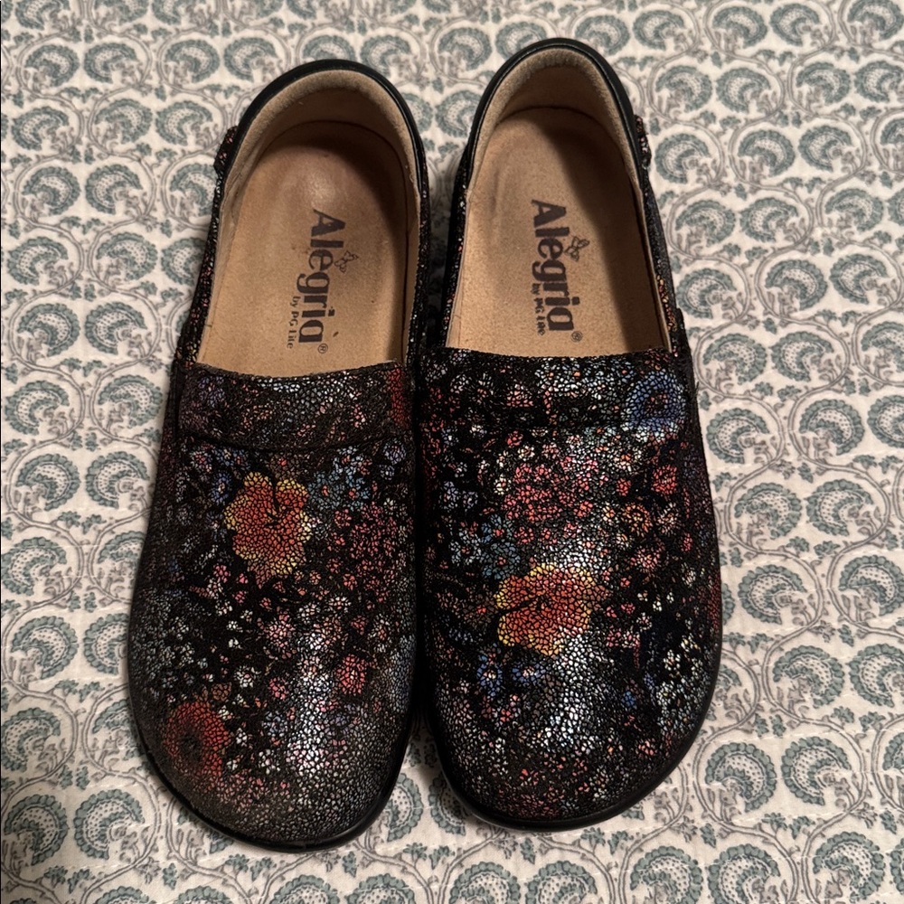 Alegria Glittery Slip-On Shoes in Black and Gold